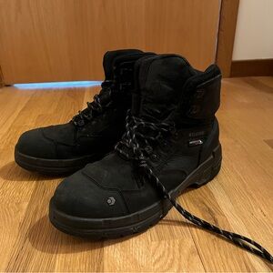 Wolverine Steel toe black work boots.